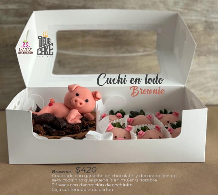 Cuchi Hombre sobre brownie con fresas con chocolate de cuchi 